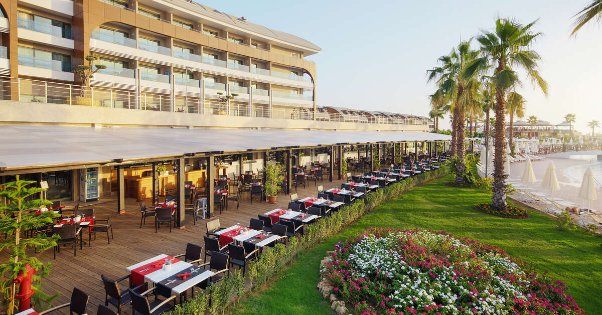 Een foto van het terras bij Magic Life Jacaranda