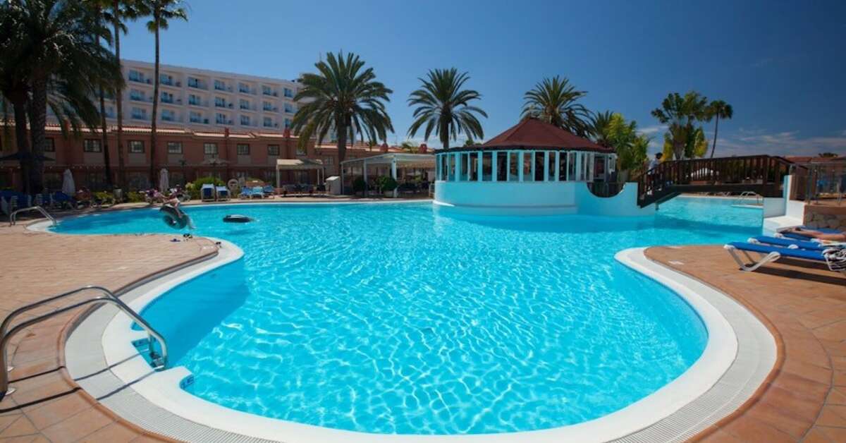 Een foto van het zwembad bij Sholeo Lodges Maspalomas