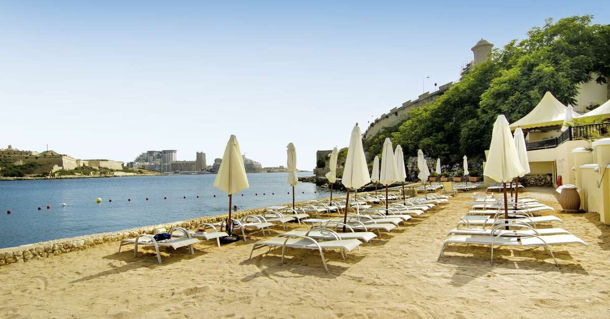 Een foto van het strand bij Grand Hotel Excelsior