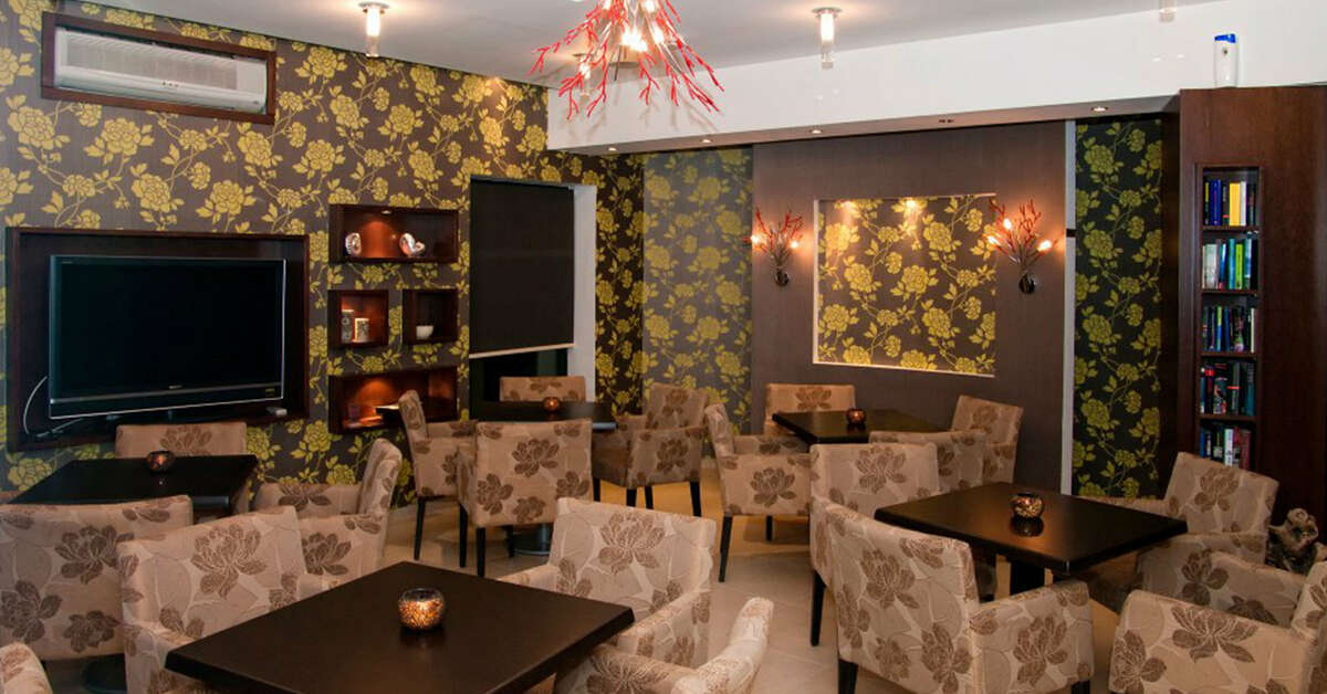 Een foto van het interieur van Nicolas Hotel