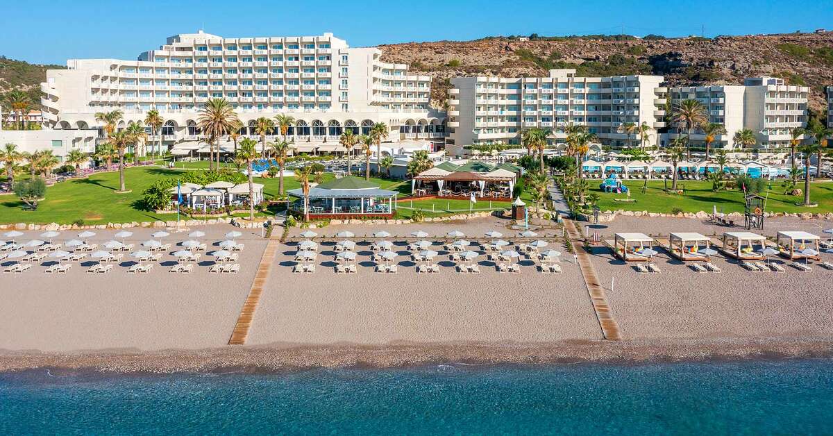 Een foto van het strand bij Rodos Palladium Hotel