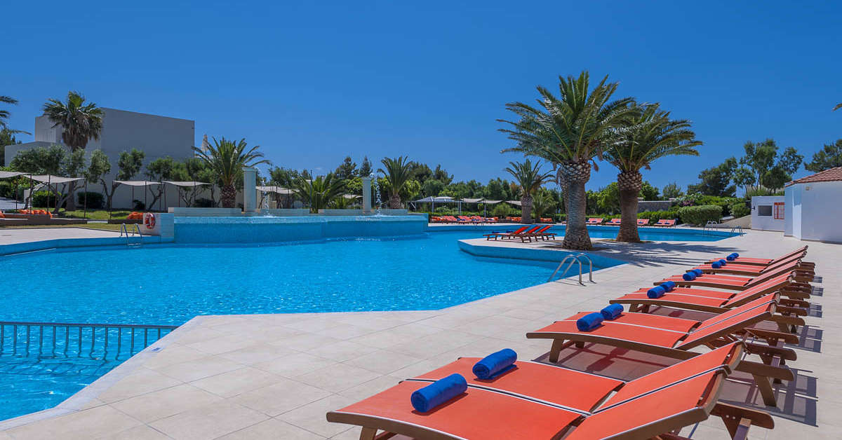 Een foto van het zwembad bij Giannoulis Almyra Hotel & Village