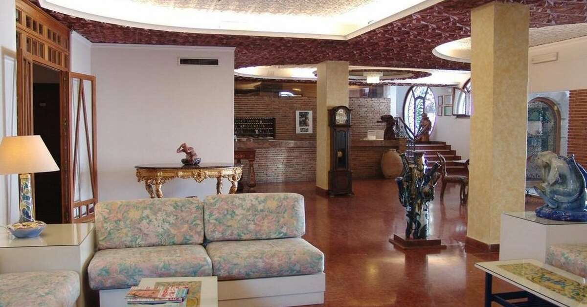 Een foto van het interieur van Hotel Vello d'Oro