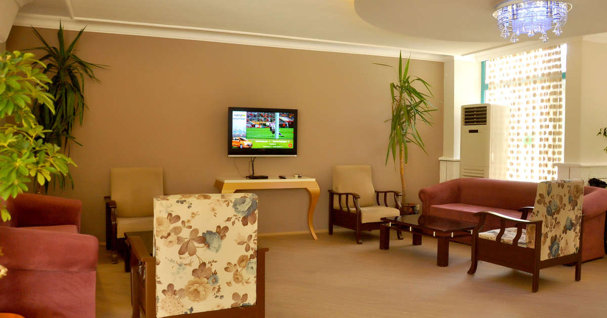 Een foto van het interieur van Cinar Family Suite Hotel