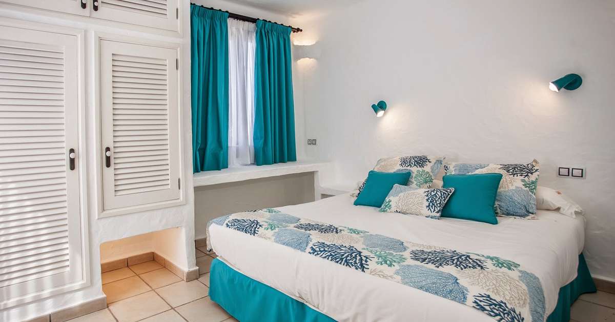 Een foto van het zwembad bij Kamezi Boutique Villas