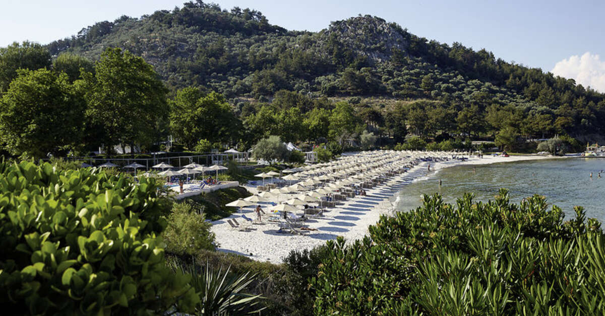Een foto van het strand bij Makryammos Bungalows
