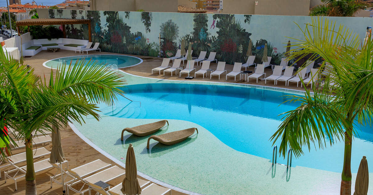 Een foto van het zwembad bij Ohasis Boutique Suites
