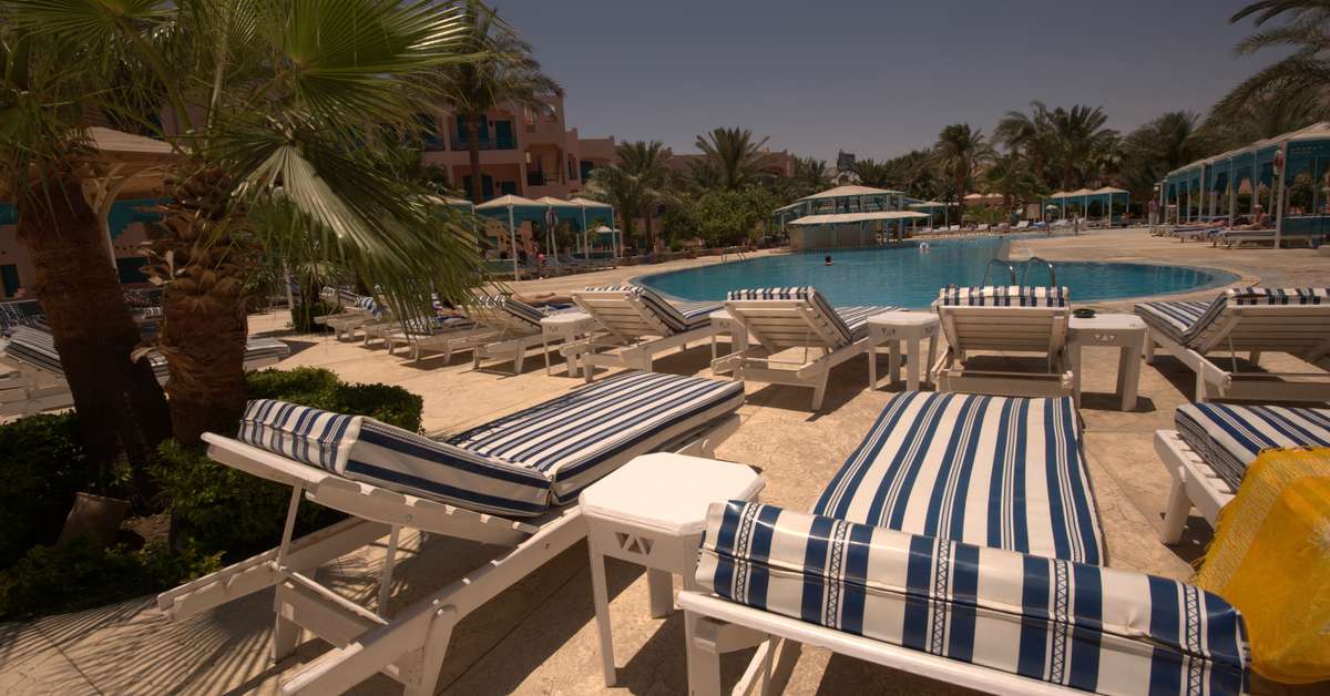 Een foto van het zwembad bij Le Pacha Resort
