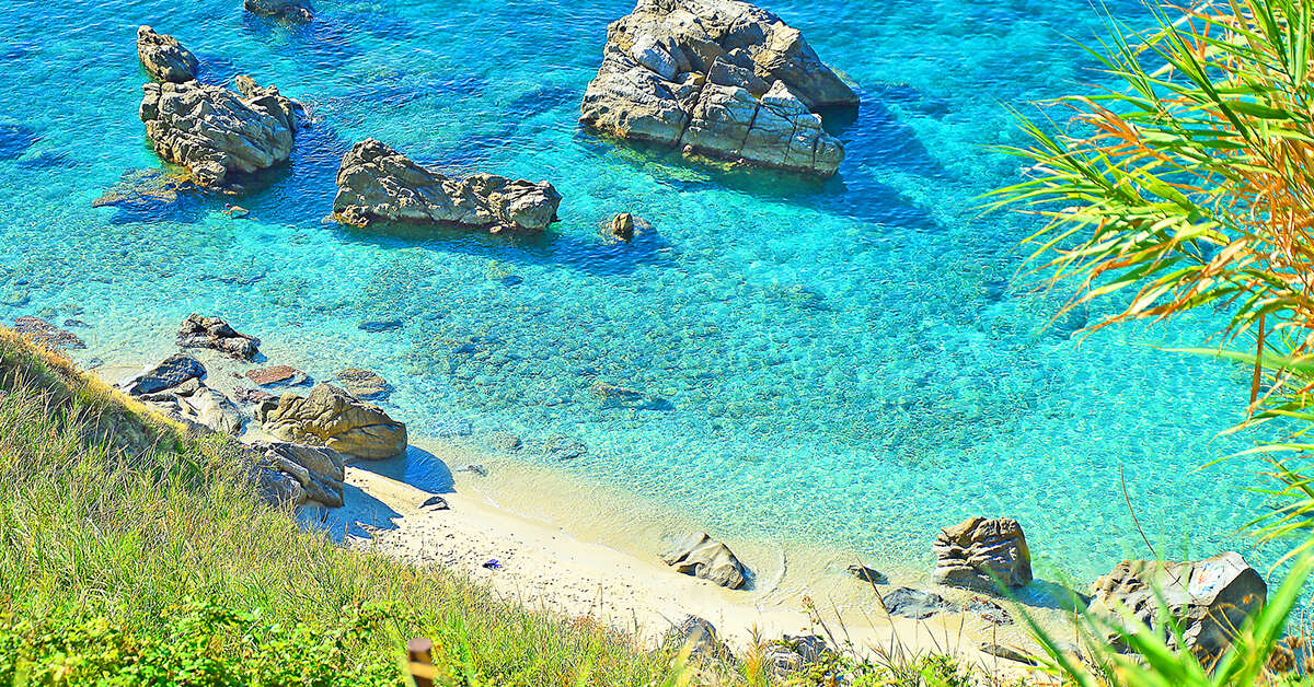 Een foto van het strand bij Appartementen Poggio di Tropea