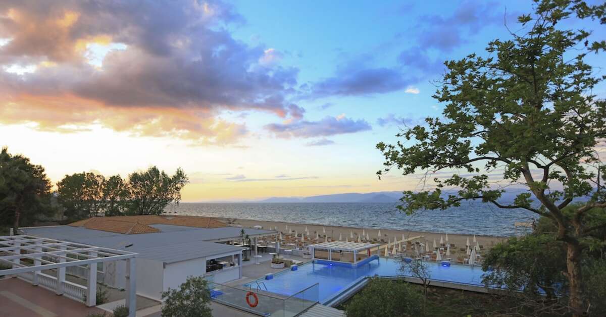 Een foto van het zwembad bij Cavomarina Beach Hotel