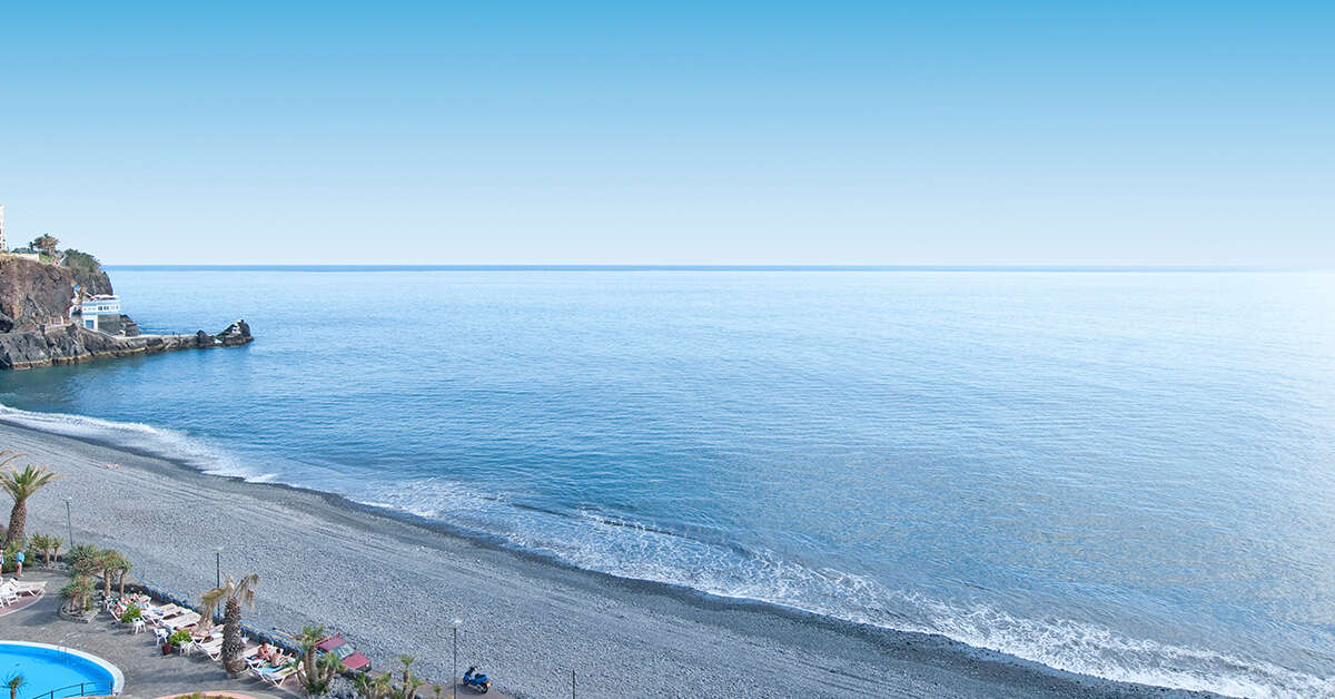 Een foto van het strand bij Pestana Ocean Bay