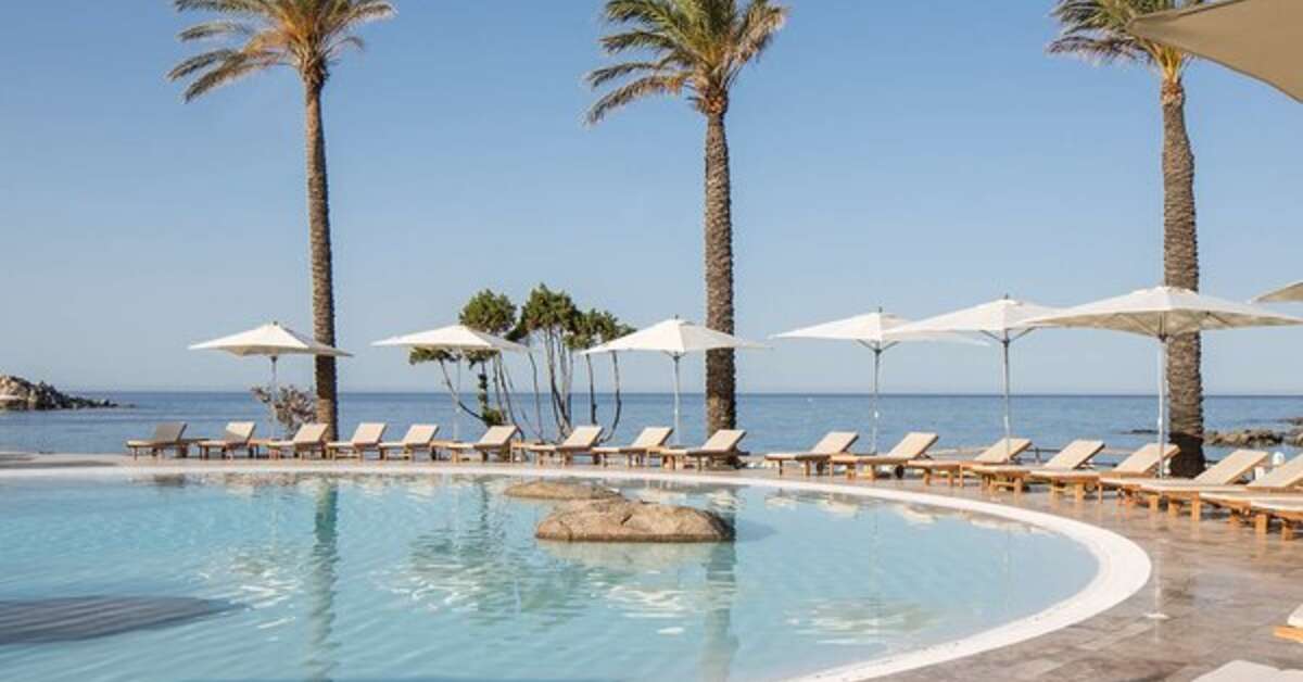 Een foto van het zwembad bij Falkensteiner Resort Capo Boi