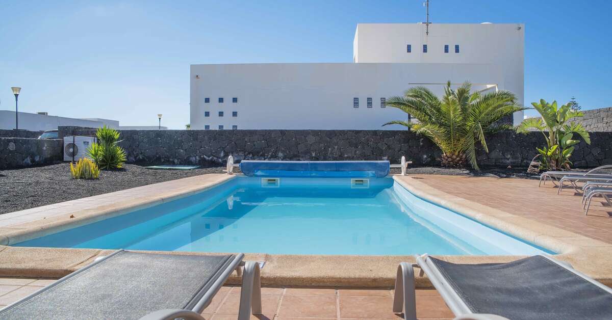Een foto van het zwembad bij Villas Blancas