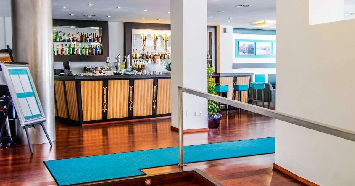 Een foto van het interieur van Hoposa Hotel Daina