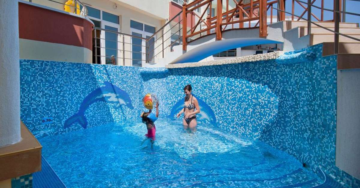 Ein Foto vom Pool im Villa List Hotel