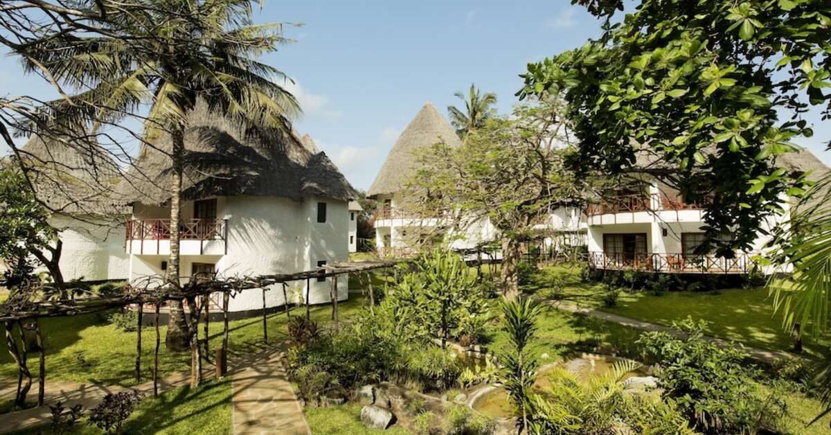 Een foto van de buitenkant van Neptune Village Beach Resort & Spa