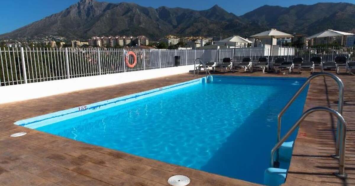 Een foto van het zwembad bij Marbella Inn Aparthotel