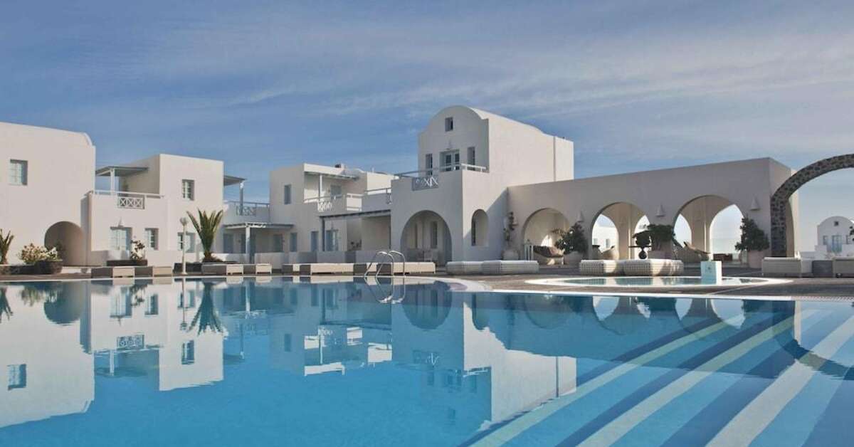 Een foto van het zwembad bij El Greco Resort & Spa