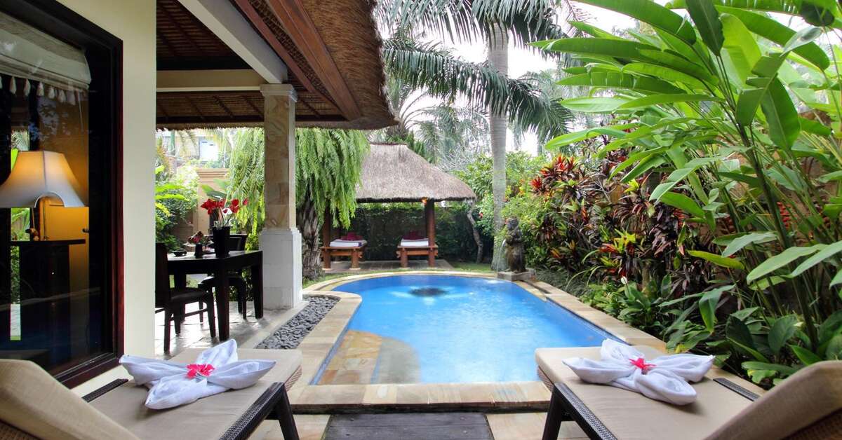 Een foto van het zwembad bij Furama Villas & Spa Ubud
