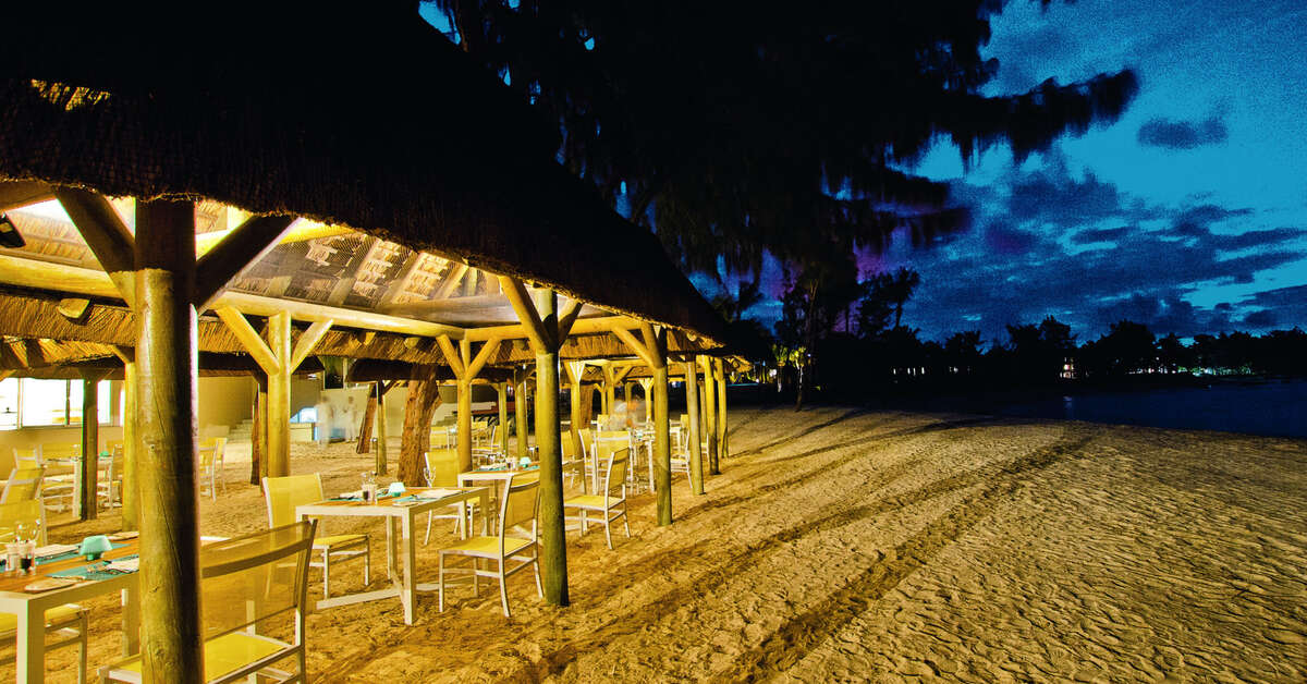 Een foto van het strand bij Ambre Resort & Spa