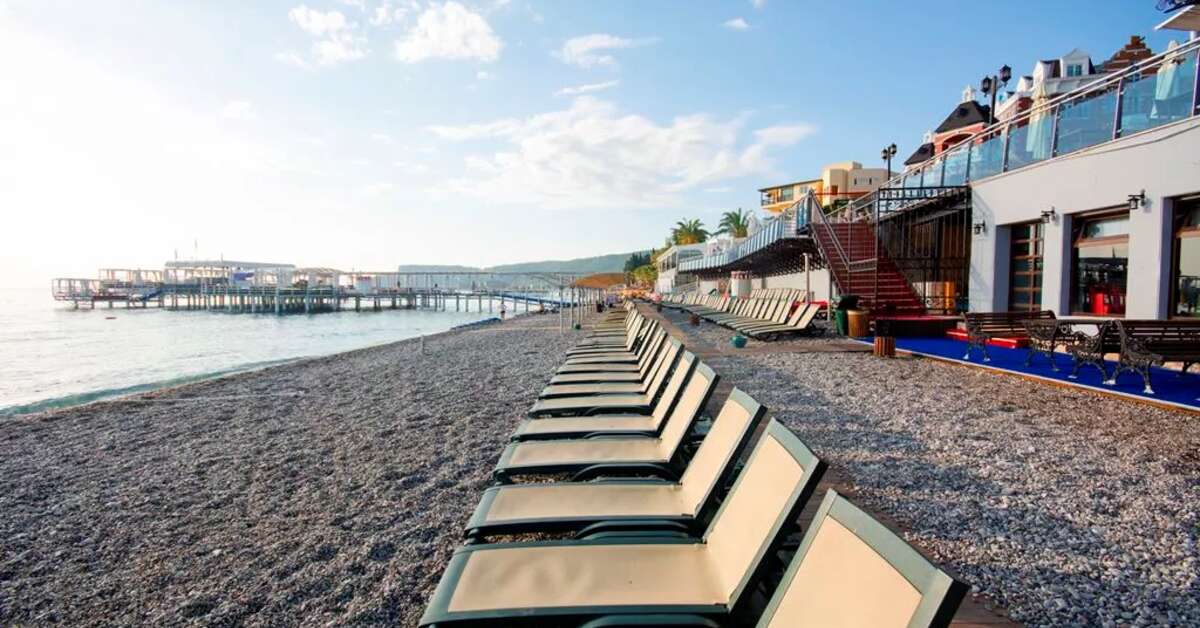 Een foto van het strand bij Orange County Kemer Resort Hotel