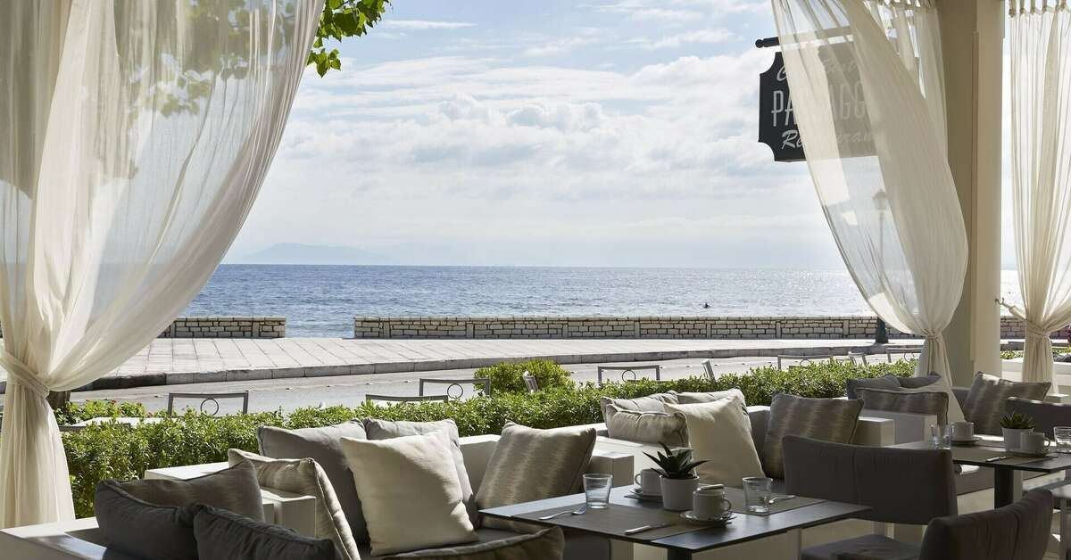 Een foto van het terras bij Mon Repos Palace Hotel