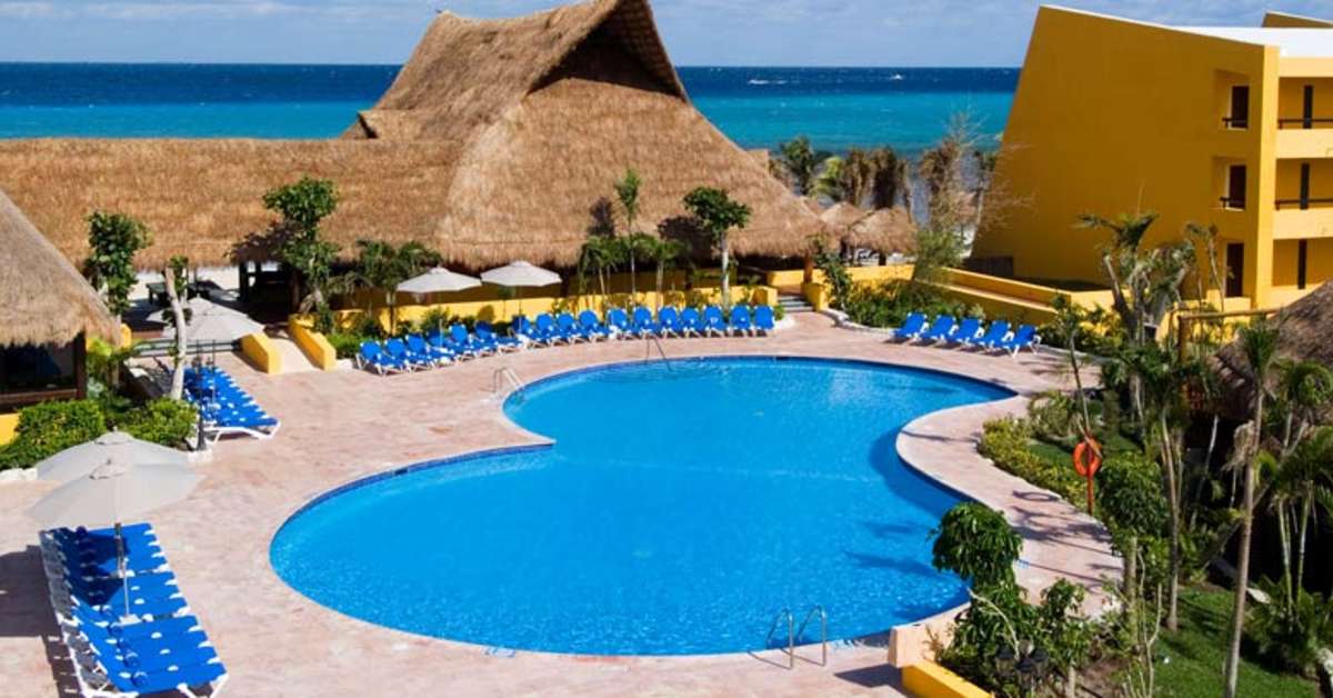 Een foto van het zwembad bij Melia Cozumel All Inclusive