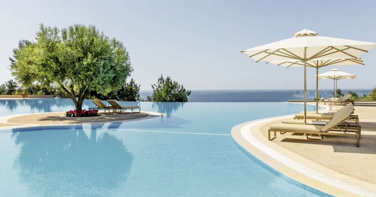 Een foto van het zwembad bij Ikos Oceania