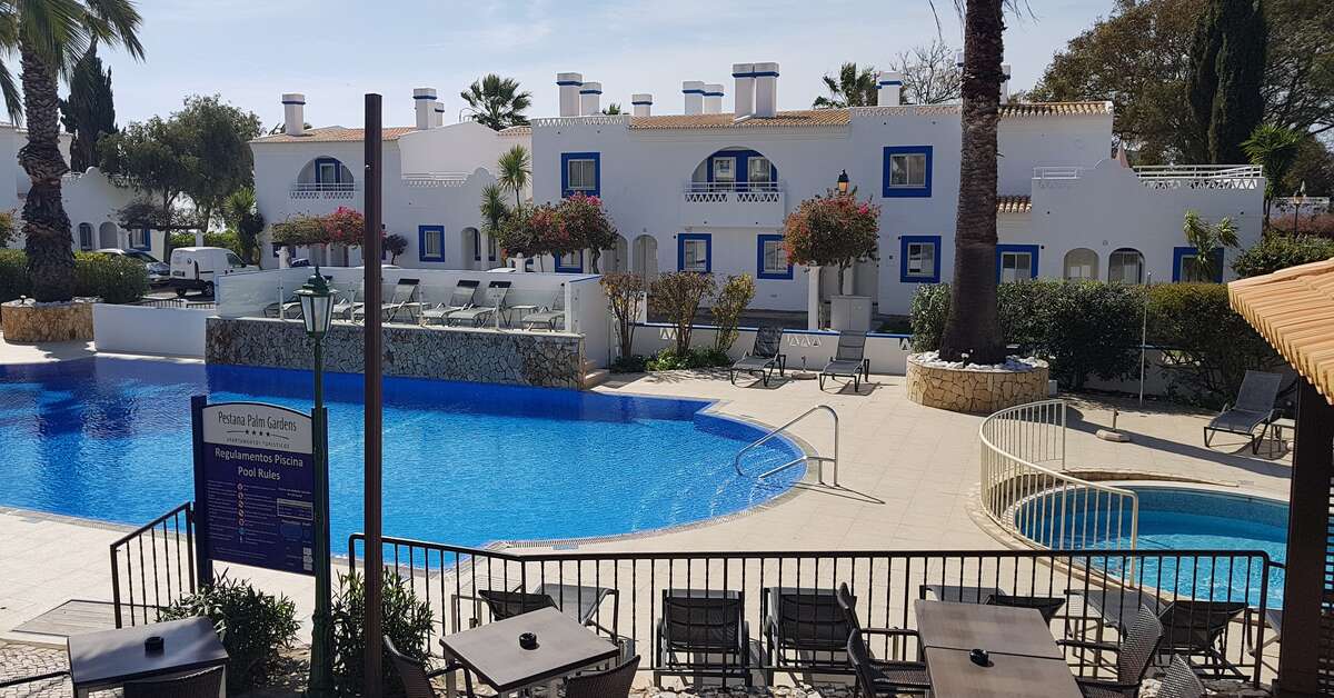 Een foto van het zwembad bij Pestana Palm Gardens