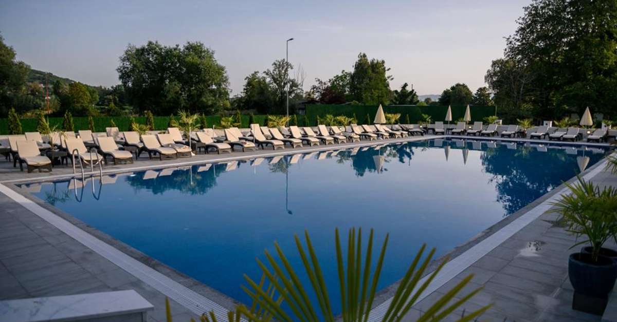 Een foto van het zwembad bij Unique Resort & Spa