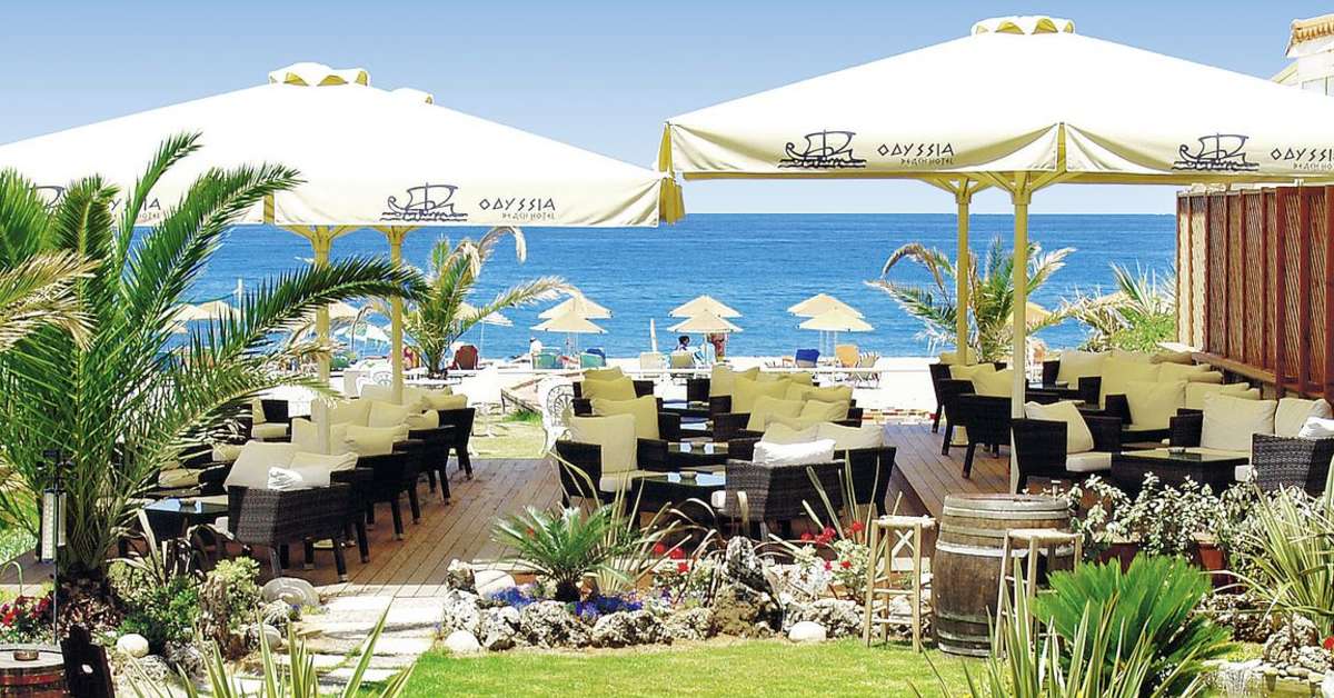 Een foto van het terras bij Odyssia Beach Hotel
