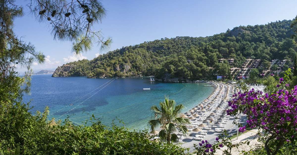 Een foto van het strand bij Hillside Beach Club