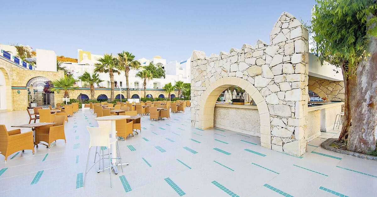 Een foto van het terras bij Salmakis Resort & Spa