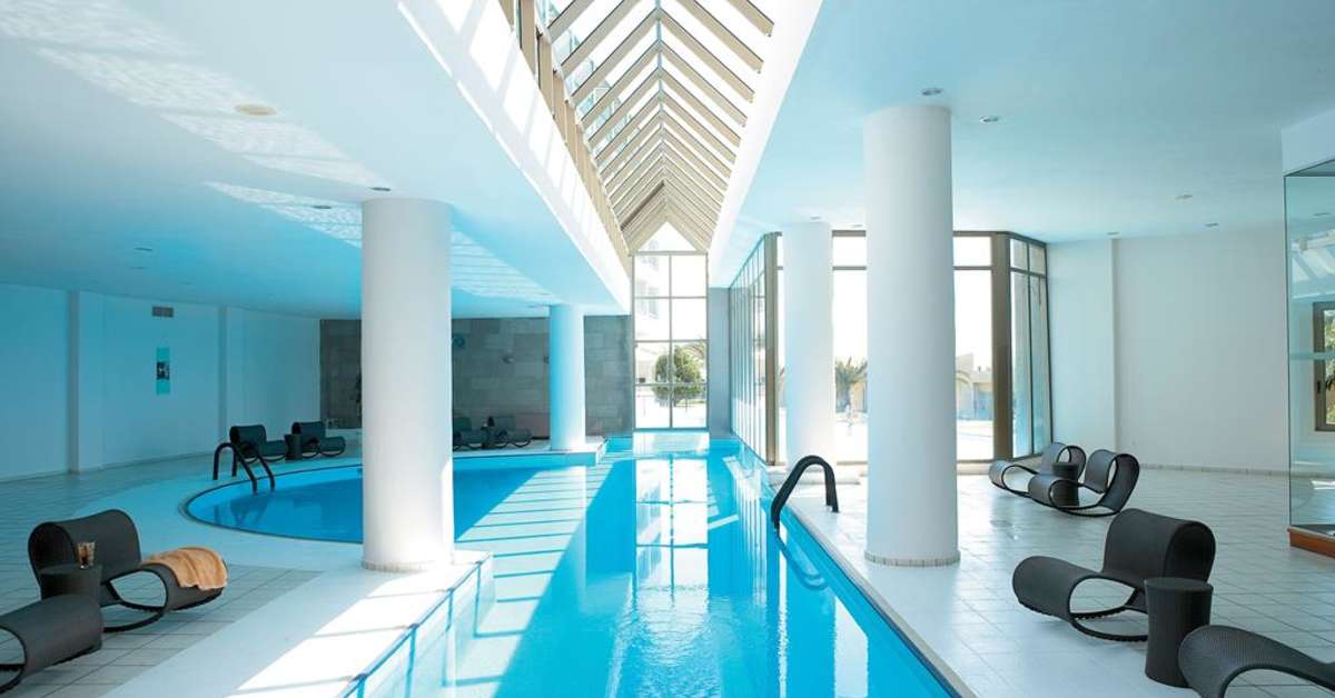 Een foto van het zwembad bij Grecotel Lux Me Dama Dama