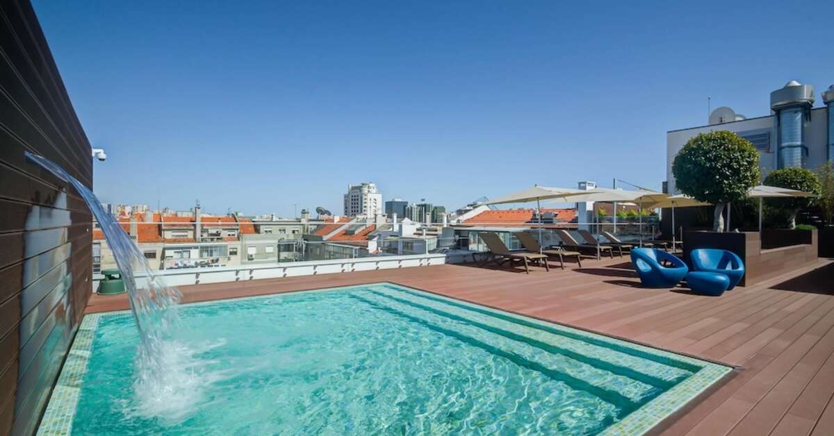 Een foto van het zwembad bij Jupiter Lisboa Hotel