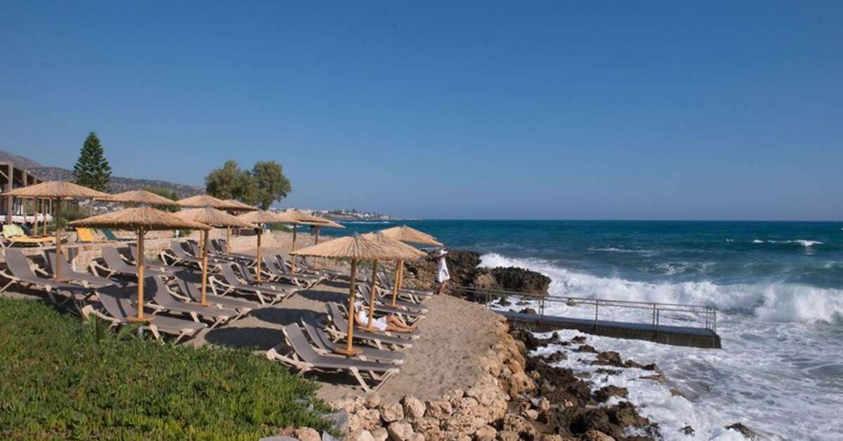 Een foto van het strand bij Hotel Cactus Bay