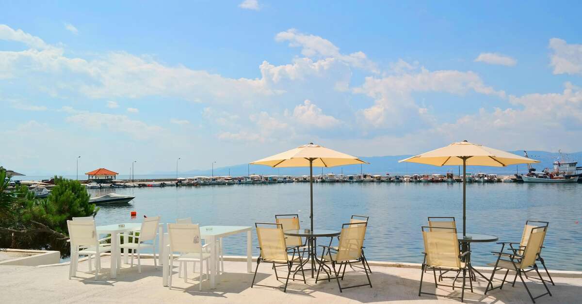 Een foto van het terras bij Porto Evia Boutique Hotel