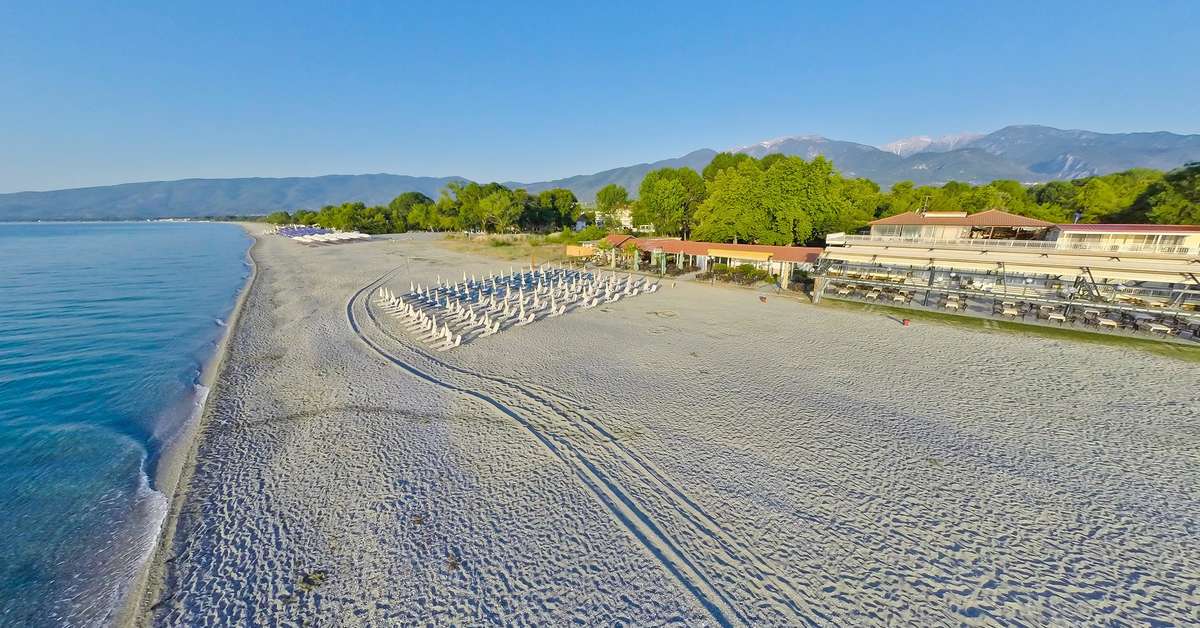 Een foto van het strand bij Olympios Zeus Hotel Bungalows