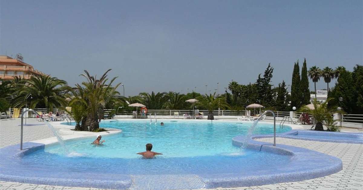 Een foto van het zwembad bij Playa Blanca Hotel