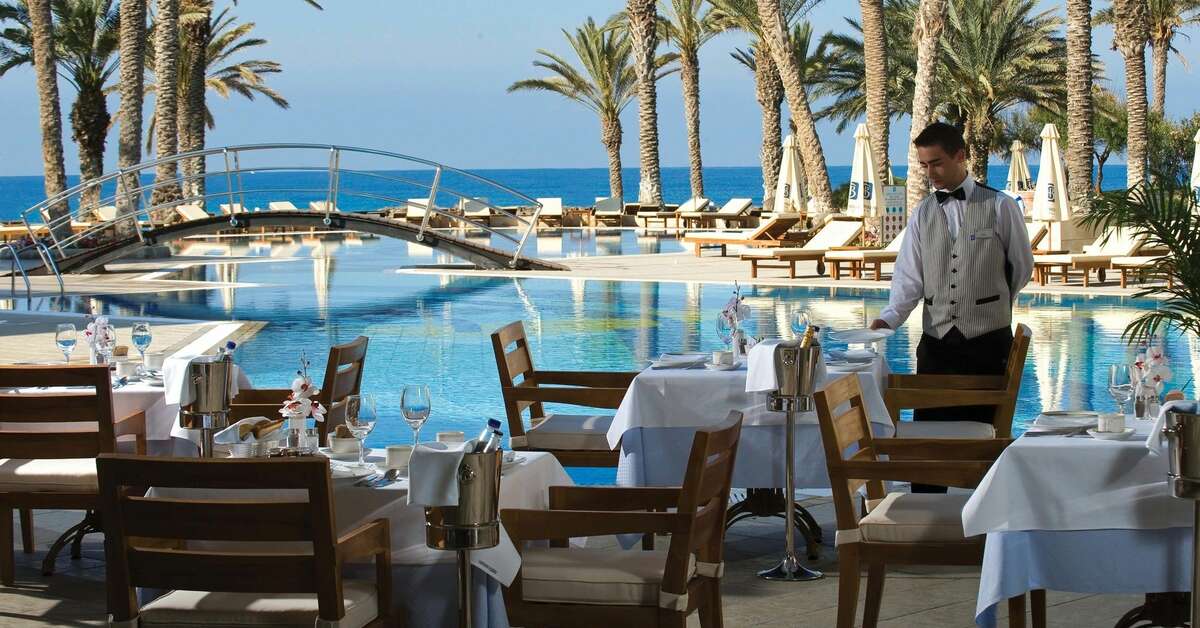 Een foto van het terras bij Constantinou Bros Asimina Suites Hotel