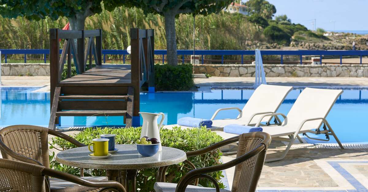 Een foto van het zwembad bij Aldemar Olympian Village