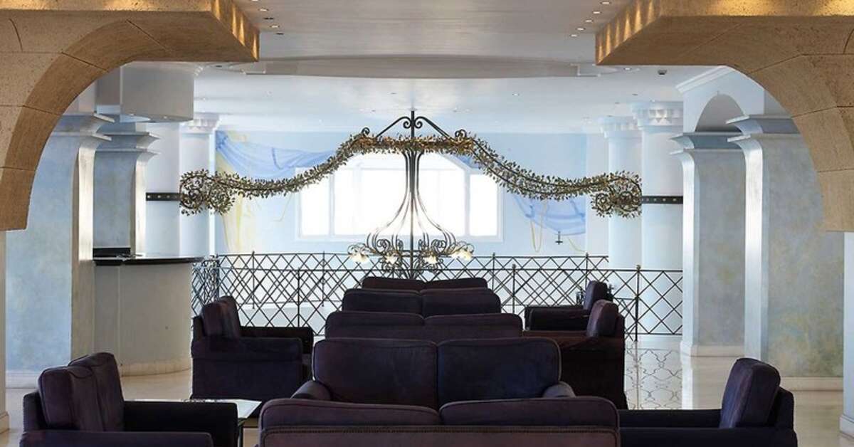 Een foto van het interieur van Mitsis Summer Palace Beach Hotel
