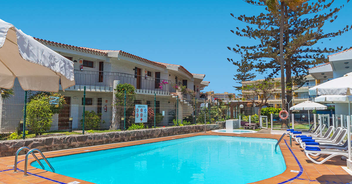 Een foto van het zwembad bij Appartementen Los Caribes I