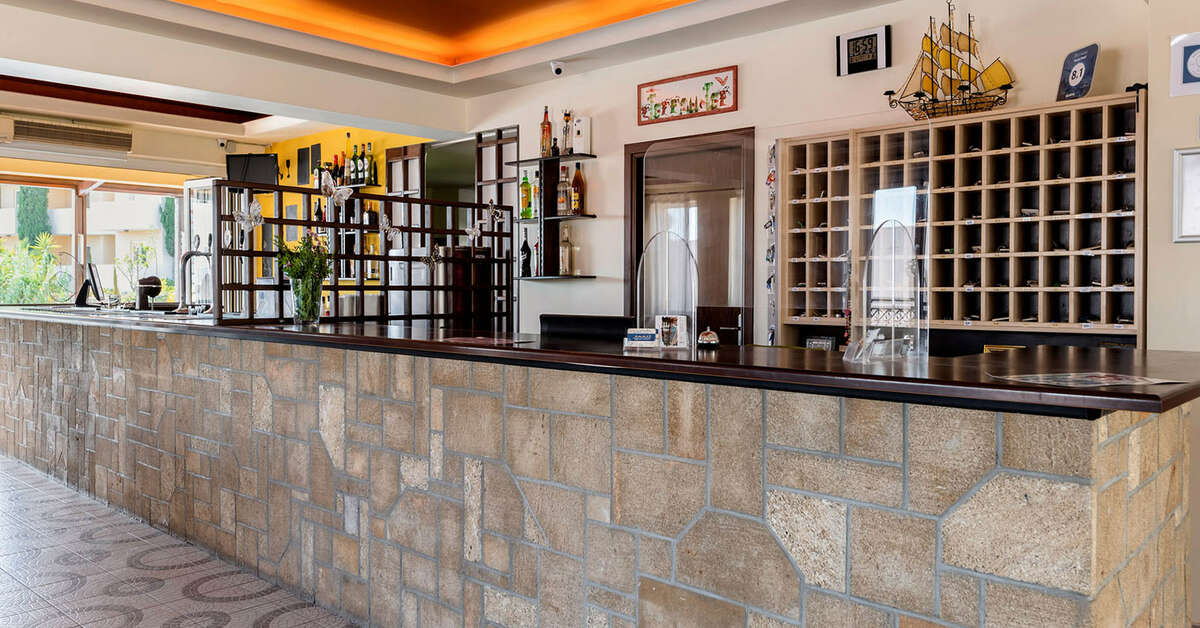 Een foto van het interieur van Stella Hotel
