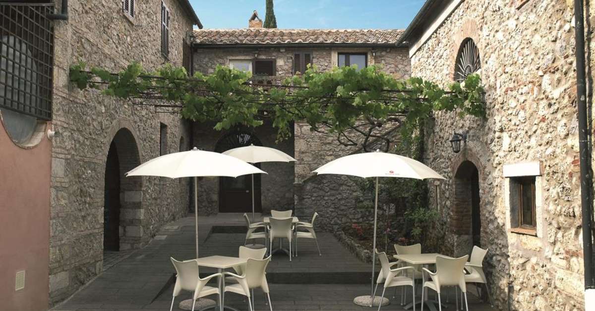 Een foto van het terras bij Pian Dei Mucini Resort