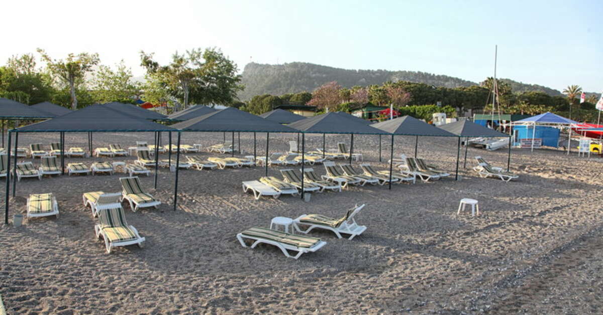 Een foto van het strand bij Queens Park Le Jardin