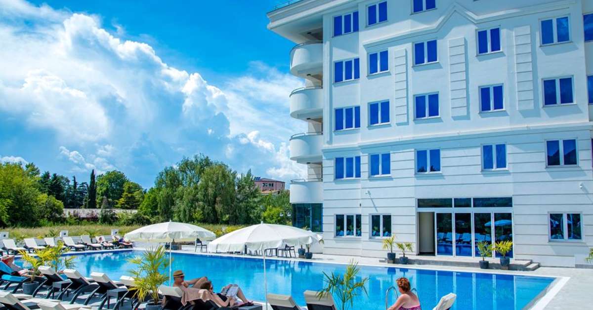Een foto van het zwembad bij Unique Resort & Spa