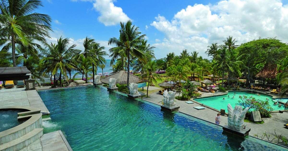Een foto van het zwembad bij Bali Mandira Beach Resort & Spa