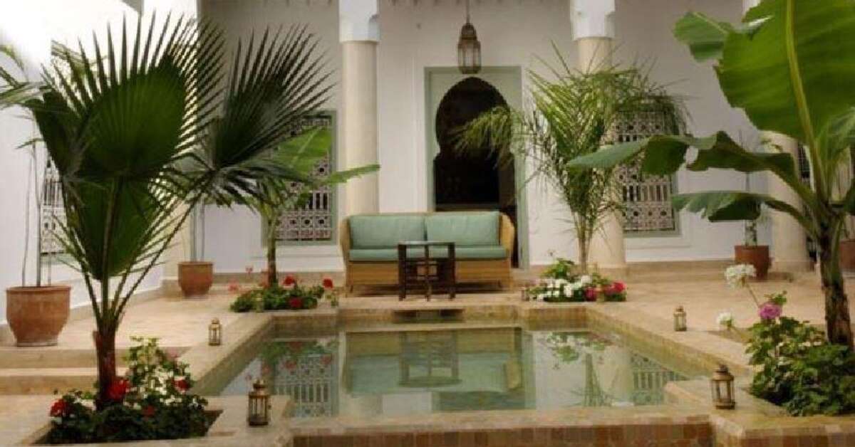 Een foto van het zwembad bij Riad Les Hibiscus