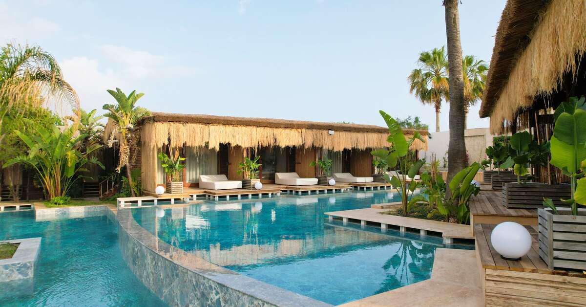 Een foto van het zwembad bij Flora Garden Beach Hotel